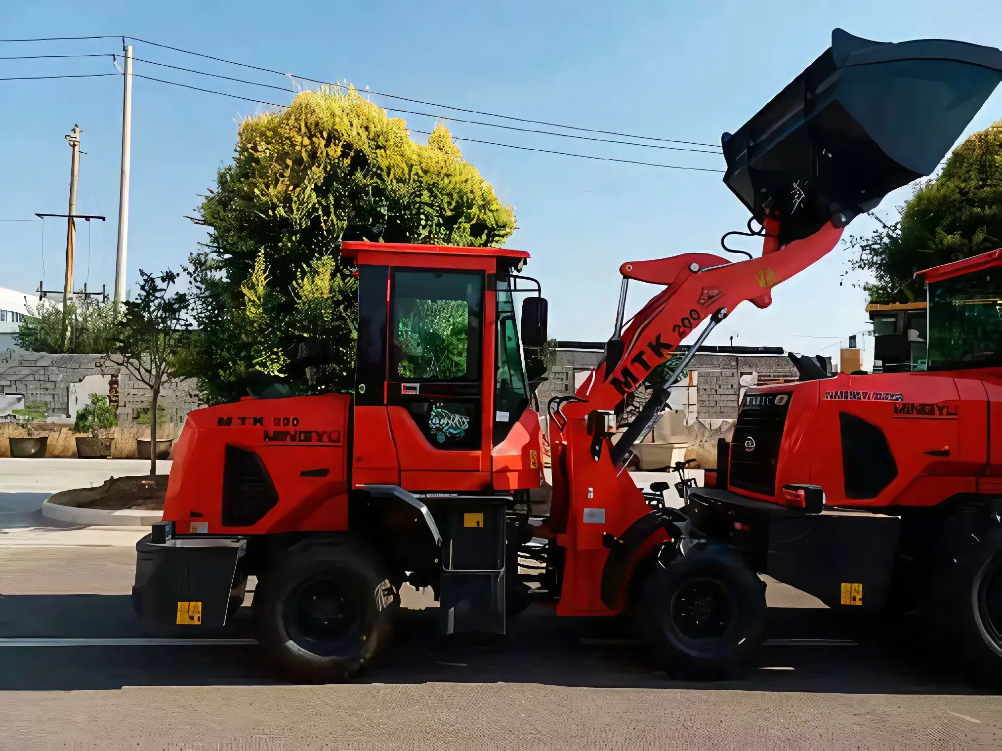 Фронтальный погрузчик МТК 200 — фото